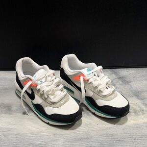 Nike White and Black Athletic Shoes with Teal and Orange Accents